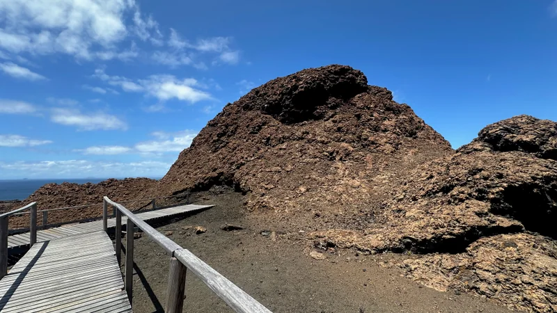 Wooden boardwalk beside volcanic formations on Bartolomé Island