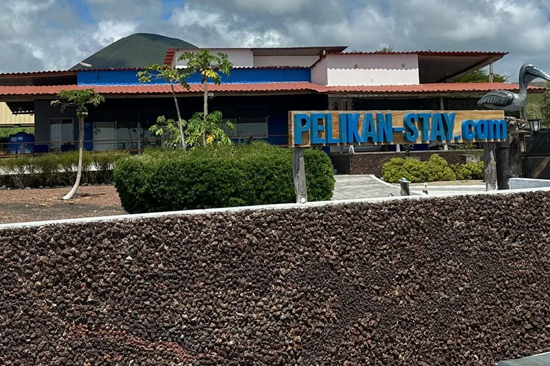 A lodging building and stone wall on Floreana